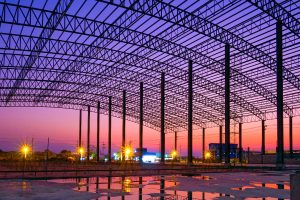 Steel building framework exposed to changing weather conditions